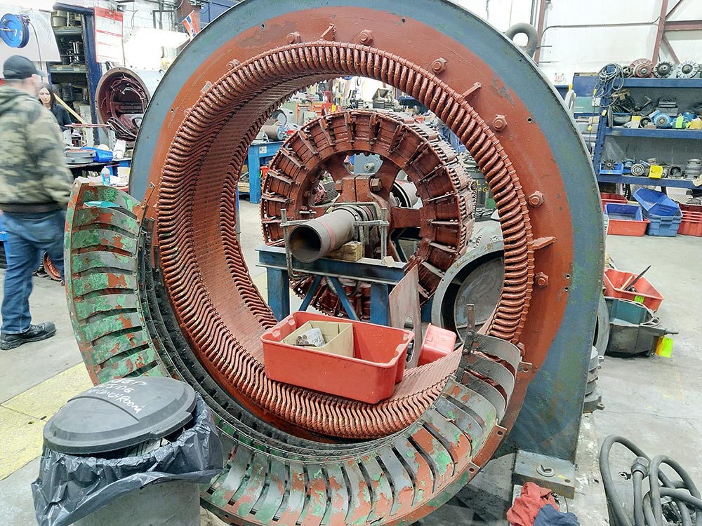 Compressor motor in Duke Electric shop for repair