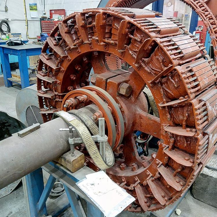 English Electric compressor motor part in Duke Electric shop for repair